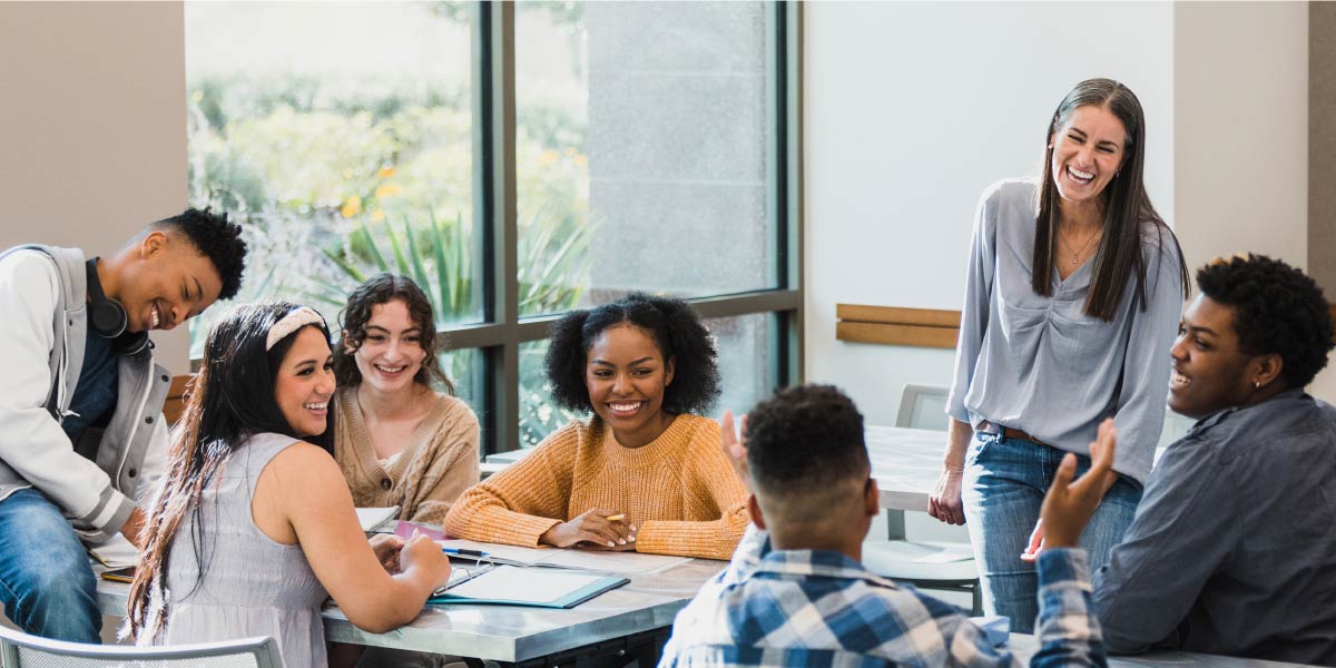 a classroom of students with a teacher